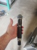 Shure Axient digital Mic Cardi B threw at a person. Auctioned for charity.